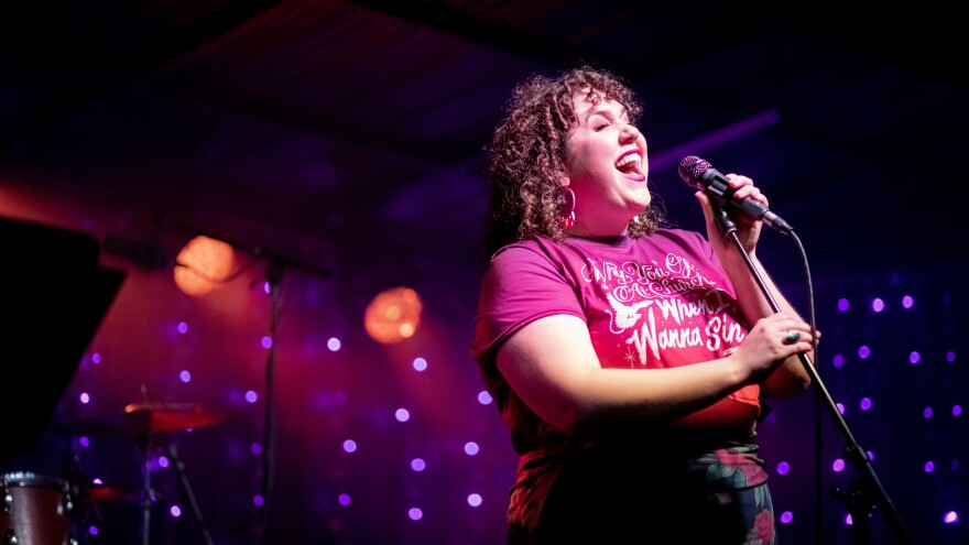 Ariel Arbisser performs at her Sept. 17 album release shwo at the Ithaca Farmers Market.