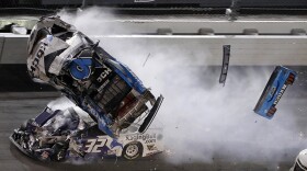 Ryan Newman (6) goes airborne after crashing into Corey LaJoie (32) during the NASCAR Daytona 500 auto race Monday, Feb. 17, 2020, at Daytona International Speedway in Daytona Beach, Fla. Sunday's running of the race was postponed by rain.