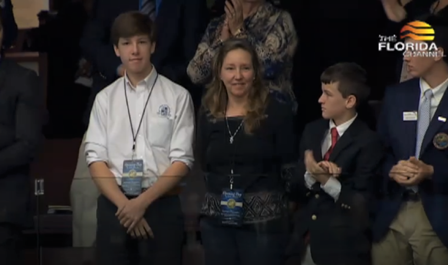 Gant Lee and his mother, Alyson Hochstedler, watch proceedings in the Florida House of Representatives to mark the opening day of session, January 9, 2018.