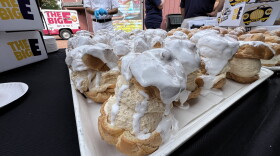 This year's renditions of The Big E's iconic cream puffs includes one with a "Fluffernutter" twist - peanut butter-infused cream with marshmallow sauce drizzled on top.