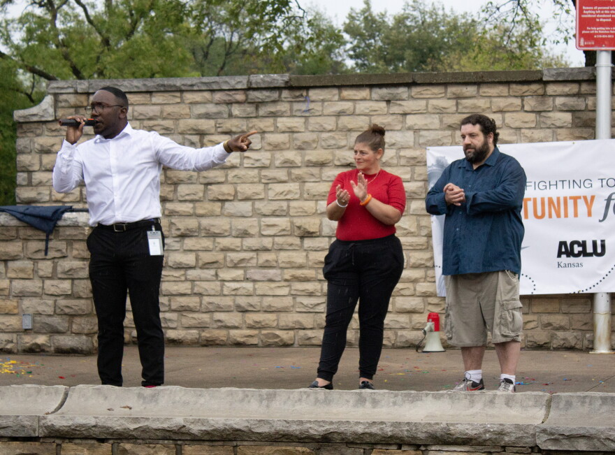 Wichita City Council members Joseph Shepard, Maggie Ballard and Mike Hoheisel speak out against 287(g) agreements during an ACLU protest on Tuesday at Riverside Park.