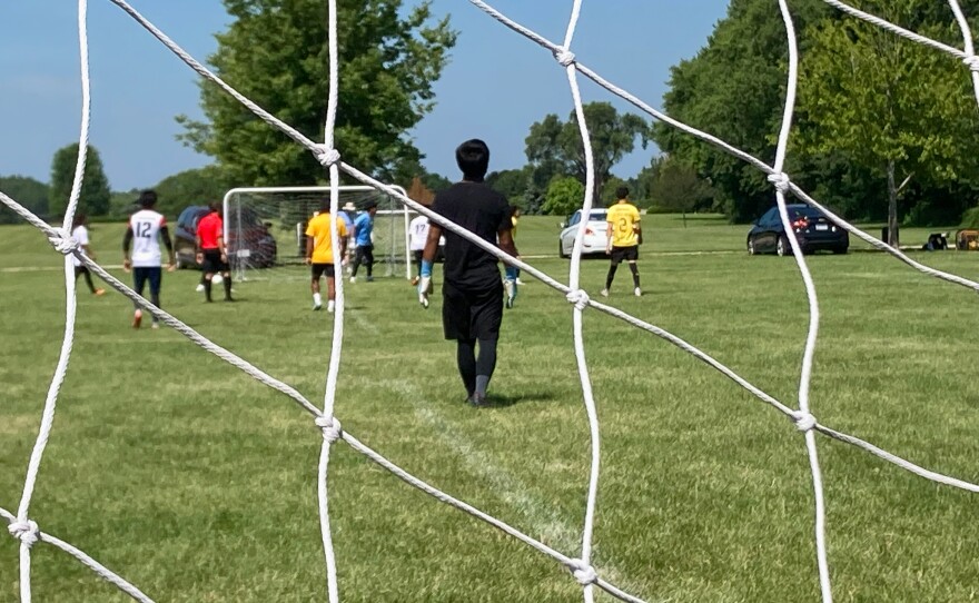 The soccer tournament featured twelve teams in competition.
