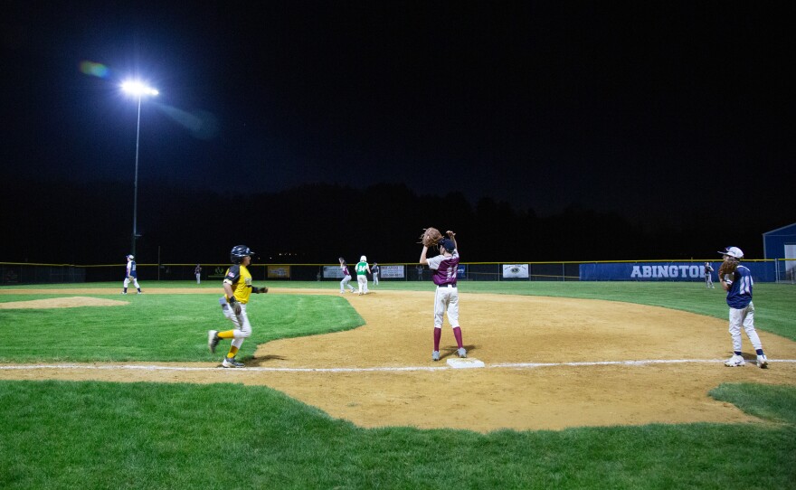 Abington Little League played under new lights for the first time on Monday.