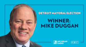 blue graphic with photo of Mike Duggan with text that says "detroit mayoral race winner: mike duggan"