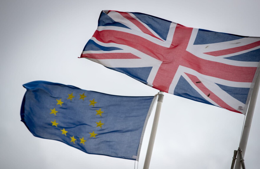 The Union Jack flag flies besides the flag of the European Union in front of City Hall in Cardiff, Wales. (Matt Cardy/Getty Images)