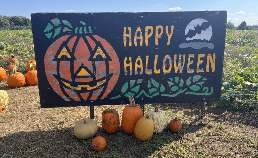 A sign at the Uncle John's Cider Mill pumpkin patch entrance.