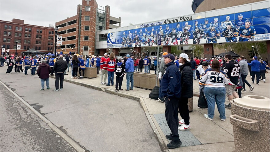 Hockey fans gather outside KeyBank Center for a game against the Montreal Canadiens during the 2025-26 Stanley Cup Playoffs.