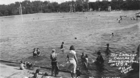 View of "The Big Dipper" located in Garden City, Kansas. At the time, the pool was 218 ft. x 337 ft., and located in Finnup Park. Date: Between 1920 and 1939 (Photo Courtesy of Kansas Historical Society/kansasmemory.org)