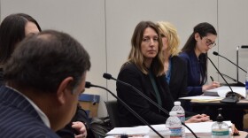 Dr. Caitlin Bernard waits for a question from the Attorney General’s Office at a medical licensing hearing on May 25, 2023.