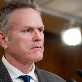 Gov. Mike Dunleavy speaks to reporters during a news conference on May 19, 2025.