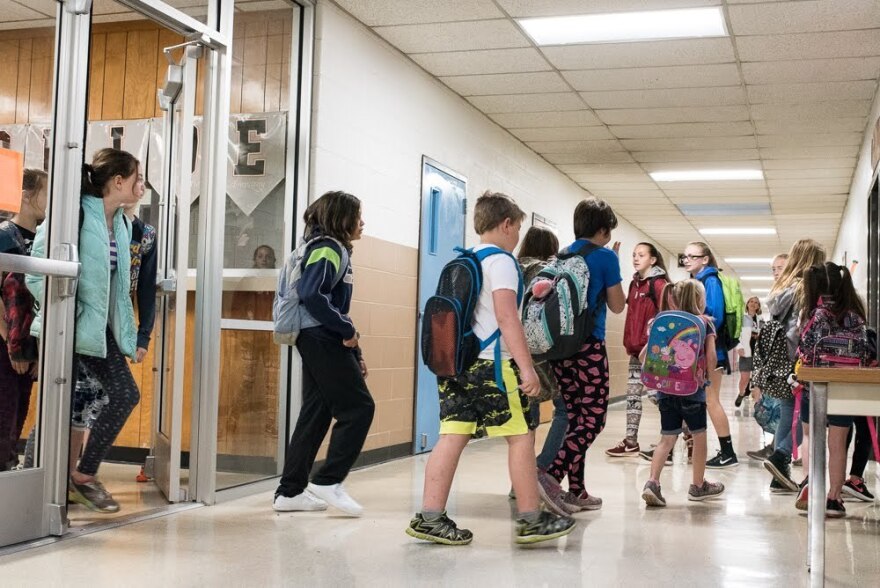 Students enter an Oklahoma elementary school.