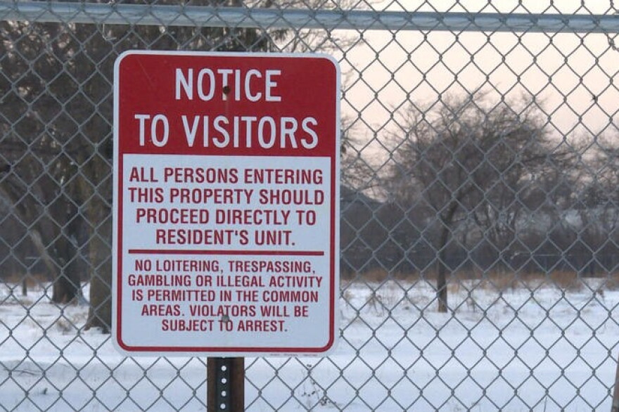 A sign outside the demolished West Calumet Housing Complex in late 2019.