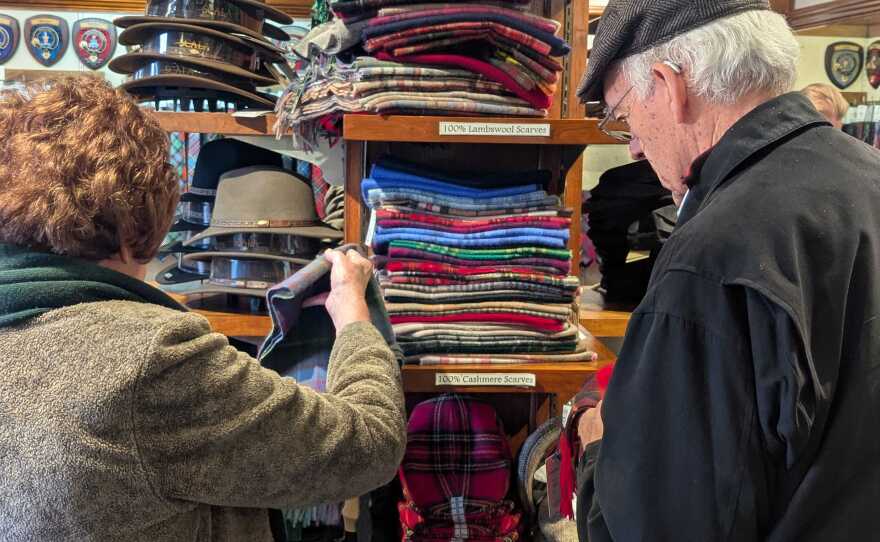 Customers searching through products at Scotland House in Williamsburg.