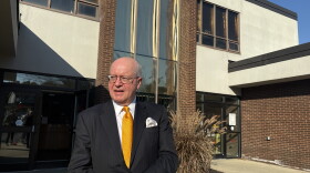 Clifton Park town attorney Kevin Dailey standing in front of town hall