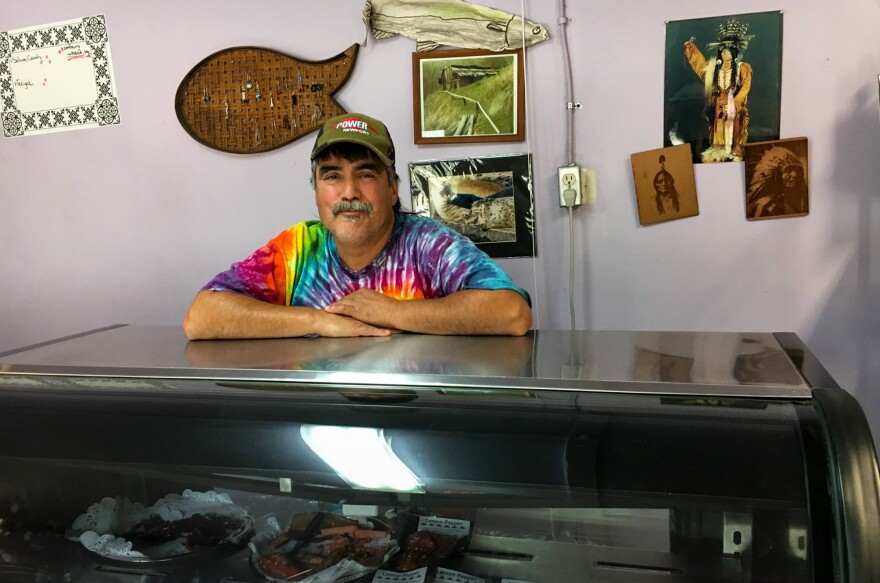 Paul Mattz Van Mechelen, who runs Paul's Famous Smoked Salmon, has had to buy salmon from fishermen hundreds of miles away instead of fishing for Chinook in the Klamath River, just 50 feet from his California shop.