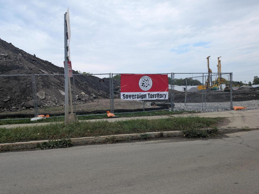 Banners proclaiming the project site to be sovereign territory were put up earlier this week. Later, the Buffalo Sewer Authority informed project leaders informed that sewage services would be suspended due to city's disputes about the land's status.