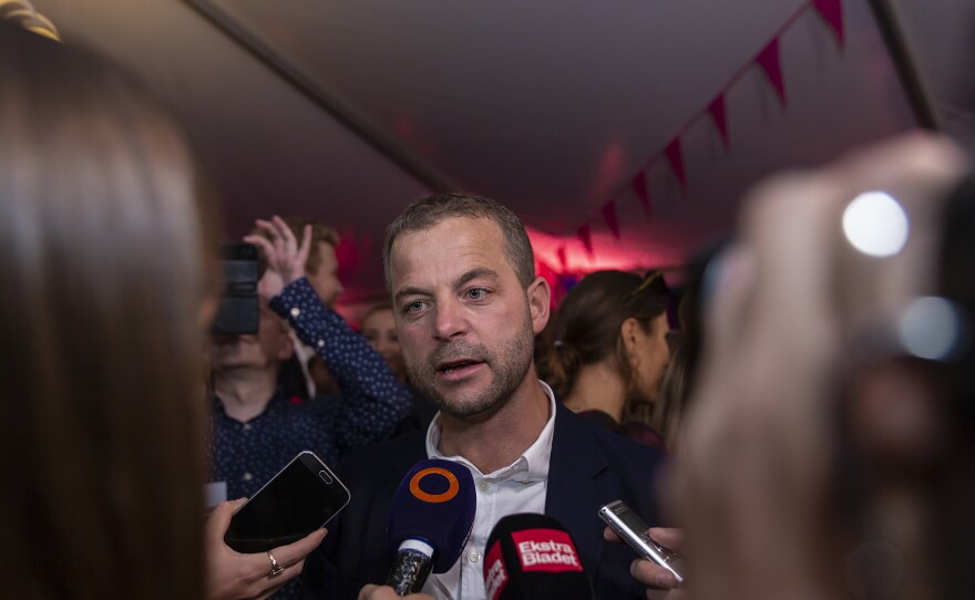 Morten Østergaard, the leader of Denmark's Social Liberal party, speaks with reporters on election night on Wednesday in Copenhagen. His party is in a position to make or break a future left-wing government with its demands. It is pro-immigration, pro-Europe and pro-environment.