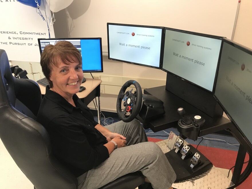 Trish Johnson with Wolfson High School's new Apex Virtual Vehicle.