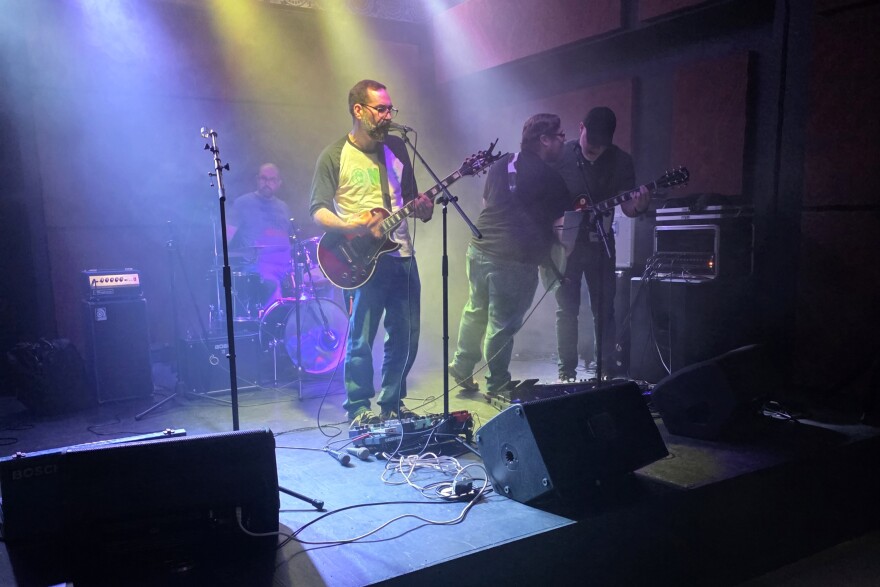 The Musical Family Tree Local Music Showcase was on November 8th at The 808. A band plays on stage.