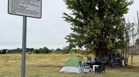 People were camping on a state-owned patch of land next to Food and Shelter in Norman on Oct. 3, 2026.