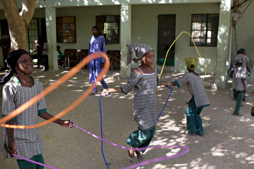 Students jump rope during recess at a school for orphaned children in Maiduguri, Nigeria, where many have a parent who was killed by Boko Haram.