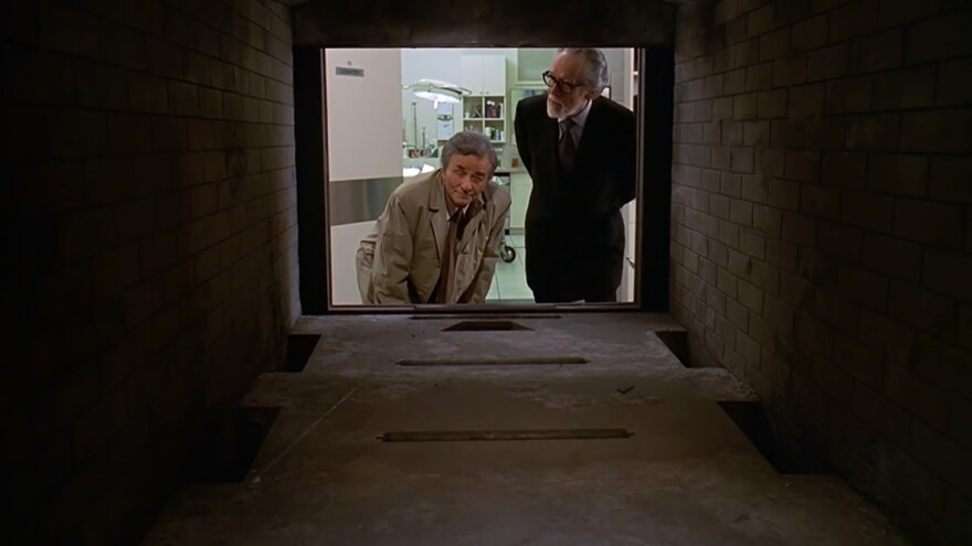 Peter Falk (left) starred in his third-to-last 'Columbo' episode -- 'Ashes to Ashes' -- in 1998. Patrick McGoohan played a funeral director, here showing the lieutenant how the cremation process works. A listener was watching this episode recently, prompting a question for 'OH Really?' [ NBC Universal]