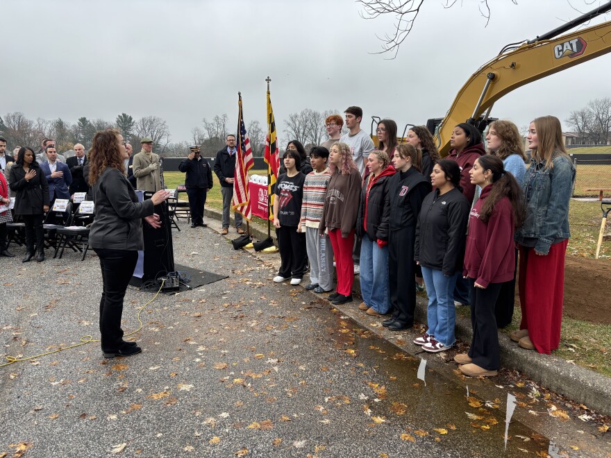 The Dulaney High School Chamber Choir performs at a ceremony marking the start of construction of a new school.
