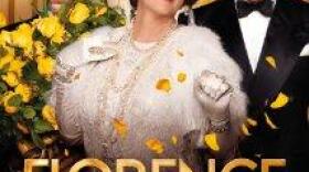 Florence Foster Jenkins movie poster - Meryl Streep in elegant white dress and tiara, Simon Helberg behind flowers on left and Hugh Grant in tux on right