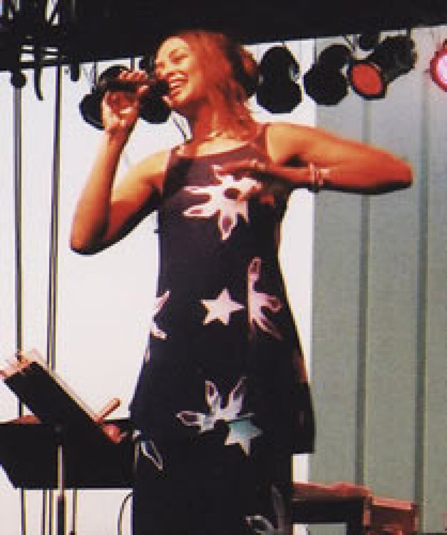 Angela Hagenbach performing in Omaha, 2003. Photo Credit: Chris Cooke.