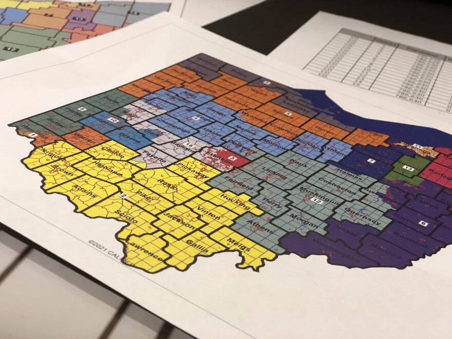 Printout of congressional district map proposed by GOP on table