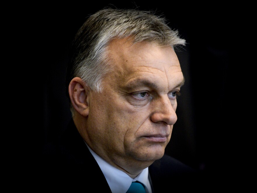 Hungarian Prime Minister Viktor Orban, pictured at a meeting with Polish president on May 14, campaigned on an anti-immigrant platform. On Monday the right-wing party passed legislation banning aid organizations and individuals from helping asylum-seekers.