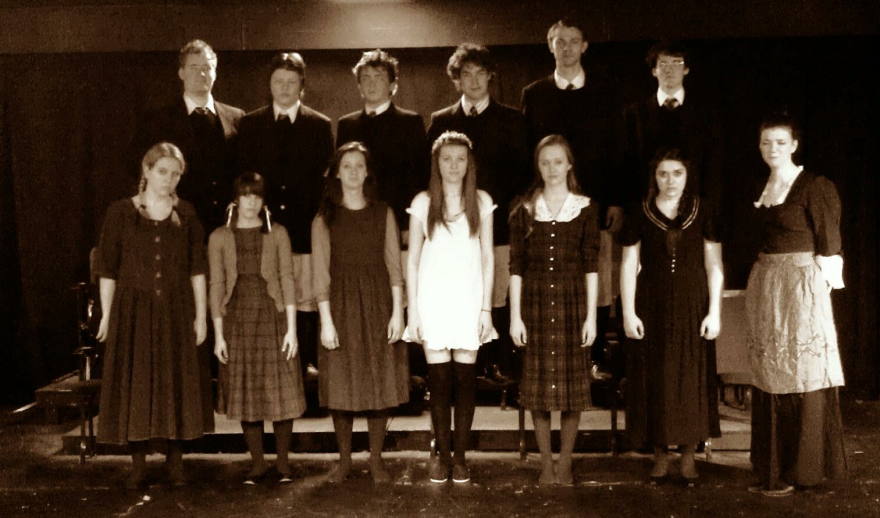 The first 2012 "Spring Awakening" cast featured — Top row (L-R): Adam Kuta, Max Moline, Aaron Lord, Garrin Jost, Andrew Bruning, Benji Lewis; bottom row (L-R): Myka Walljasper, Kelsey Miller, Becca Johnson, Haley Nellis, Andrea Bush, Eliza Ross, Rachel Guhin.