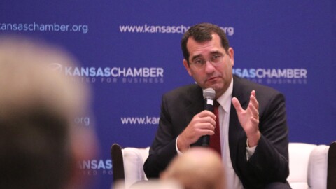 Republican Derek Schmidt speaks to a crowd at a Kansas Chamber of Commerce candidate forum.