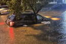 Edgar Mendez's car submerged during the August 2025 floods.