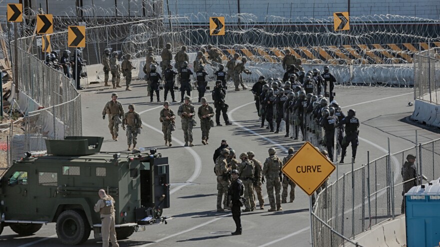 U.S. military personnel and Border Patrol agents secure the border at the San Ysidro crossing point.