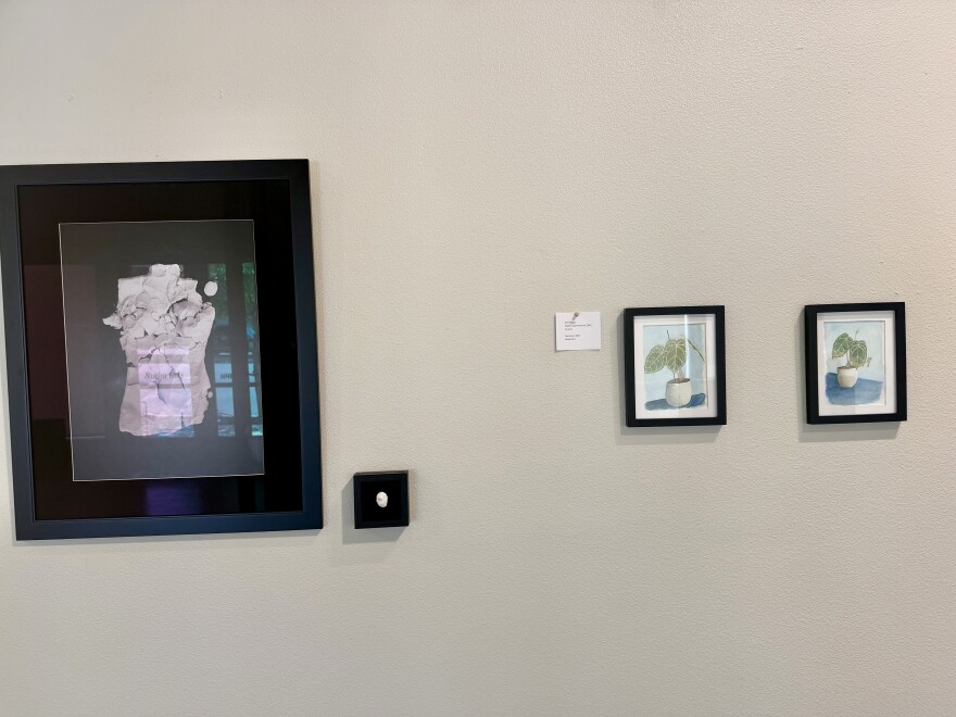 Erin Ratigan's .... Her piece juxtaposes idealism and self-expression with the brutality of real-world disappointments.