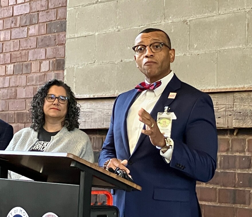 Rev. Dwight Ford, executive director of Project NOW, speaks at the January 2026 announcement of the new partnership with the city of Moline to operate a temporary winter shelter downtown, as Mayor Sangeetha Rayapati looks on.