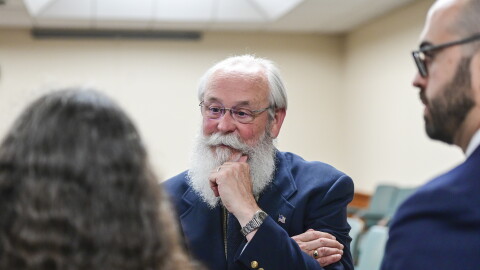 Latah County Prosecutor Bill Thompson speaks with Wendy Olson, left, and Cory Carone during a motion hearing regarding a gag order for a case against Bryan Kohberger in Latah County District Court, Friday, June 9, 2023, in Moscow, Idaho. Kohberger is accused of killing four University of Idaho students in November 2022. (Zach Wilkinson/The Moscow-Pullman Daily News via AP, Pool)