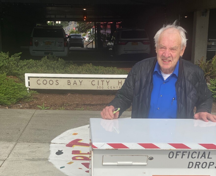 Jerry Rust spoke during a press conference Tuesday in front of the Coos Bay City Hall.