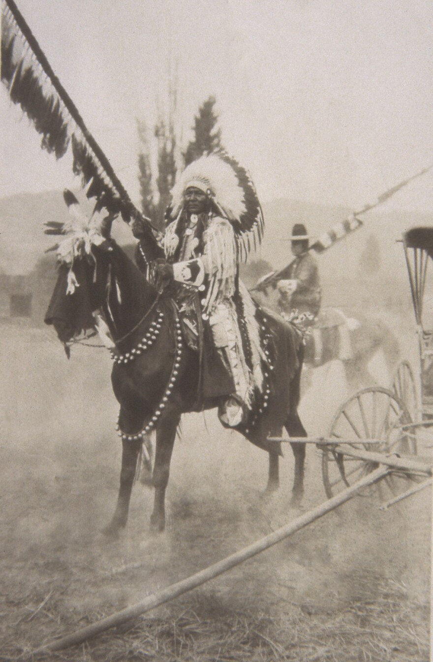 James Whitebird "Yelmis" rode on a horse in regalia at Grangeville Border Days, a rodeo that has taken place since 1912.