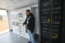 An Amazon Web Services employee describes the type of infrastructure inside a data center during an event at Luzerne County Community College.