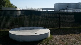 A new and improved pipe, in the foreground, brings wastewater directly to the Kalamazoo Water Reclamation Plant from the Graphic Packaging International factory, visible in the background. After sealing the pipe last October, hydrogen sulfide emissions from the plant has slightly decreased according to a January study from the Michigan Department of the Environment, Great Lakes and Energy.