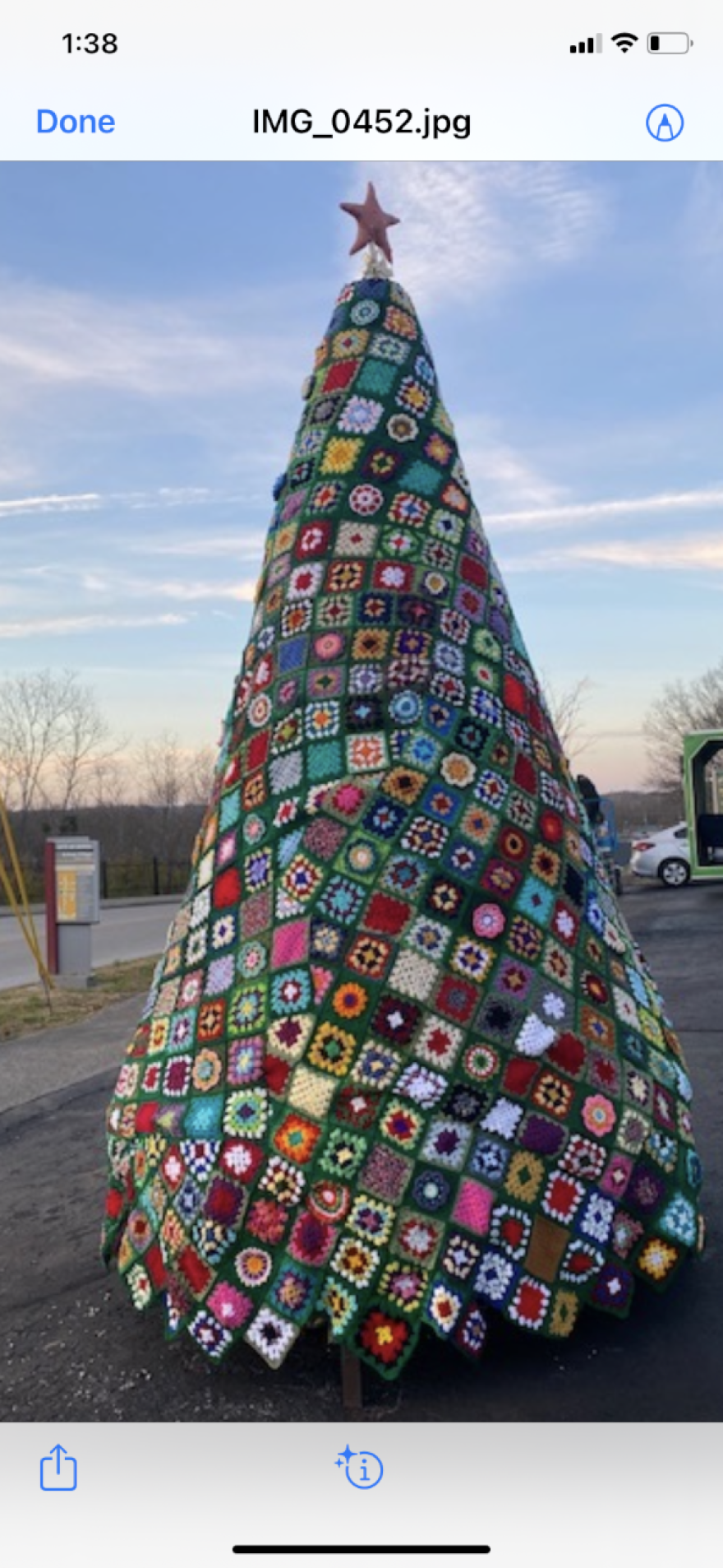 The crocheted tree is just about ready for the lighting ceremony.