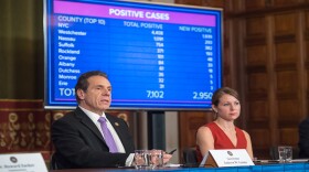 Gov. Andrew Cuomo, left, speaks Friday during a coronavirus briefing.