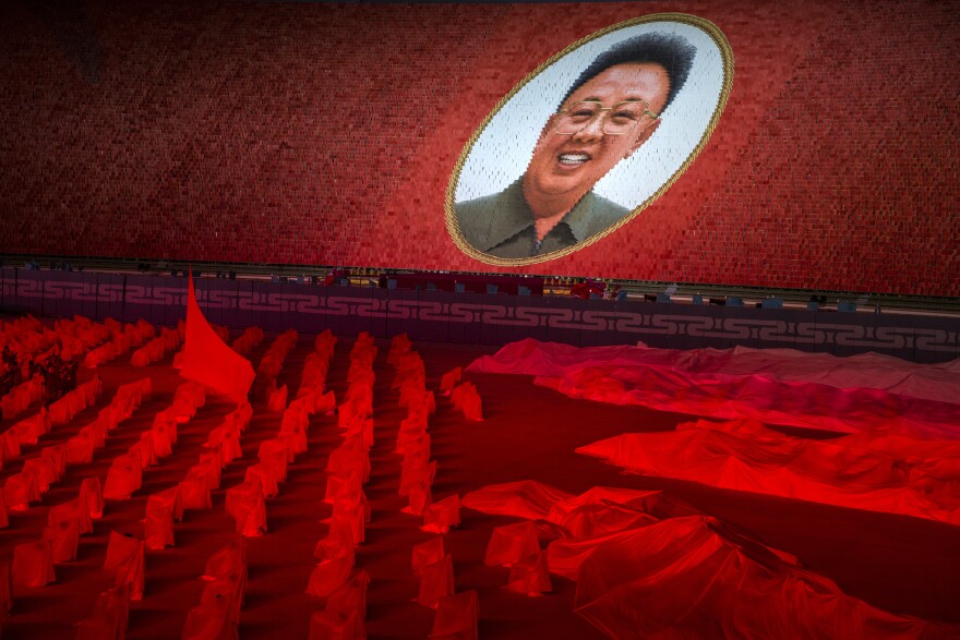 The festivities marking the 70th anniversary of North Korea's founding included the Arirang Mass Games, a huge, choreographed event held at May Day Stadium in Pyongyang. Hundreds of dancers, tumblers and musicians performed, while more than 17,000 students in the stands flipped cards to create massive images. Here, cards form a portrait of the late leader Kim Jong Il, who died in 2011.