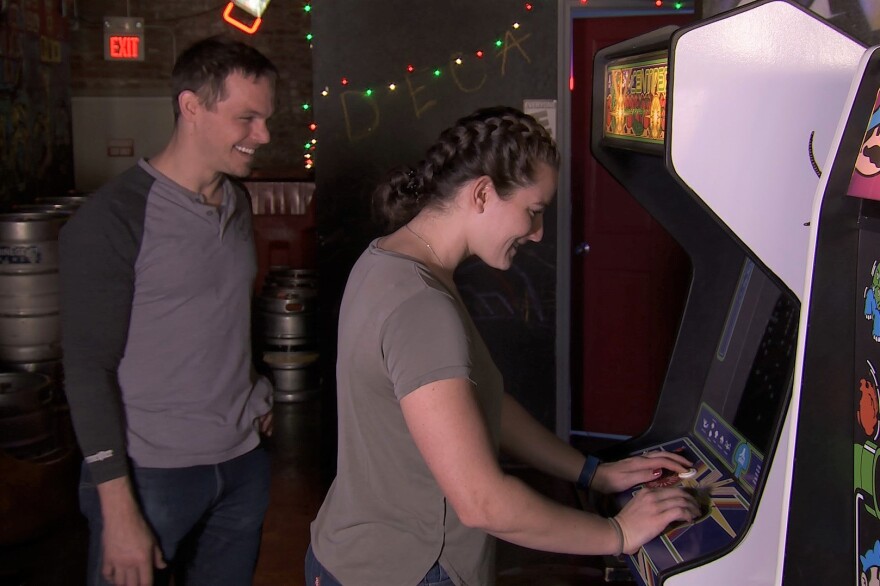 Jeremy Black (left) and Chelsea Long, co-owners of The Cade arcade bar in Bloomington.