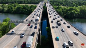 More than 50 million Americans are expected to travel at least 50 miles from home over the upcoming July Fourth weekend. Traffic in Austin, Texas, is seen here in April.
