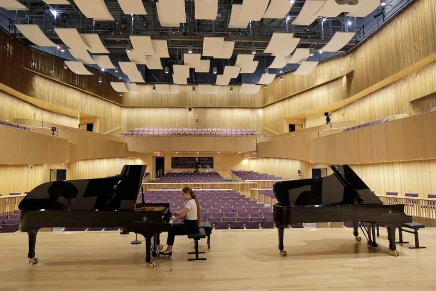 The interior of the new Van Cliburn concert hall with Russian pianist Elizaveta Kliuchereva at the keyboard.jpg