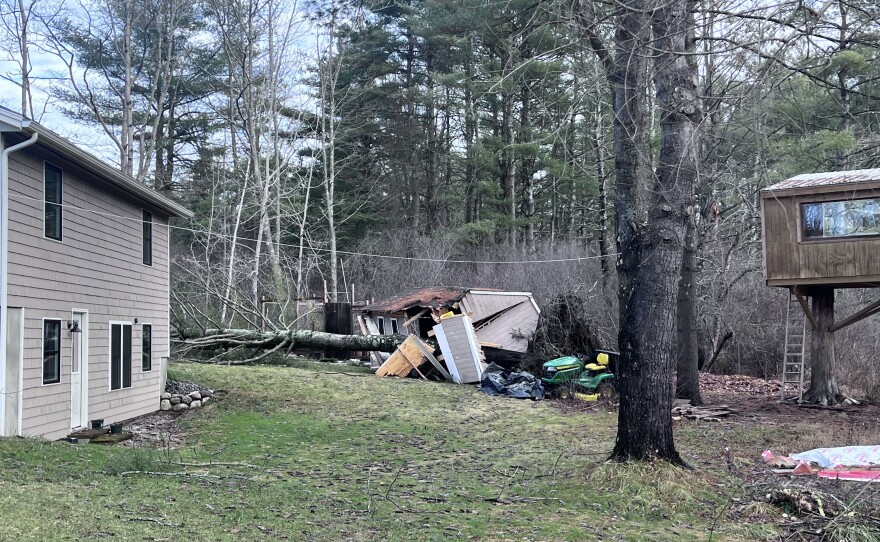 A fallen tree atop a destroyed shed in Yarmouth on Dec. 19, 2023.