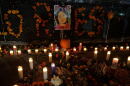 Candles placed at a vigil for late activist Dolores Huerta